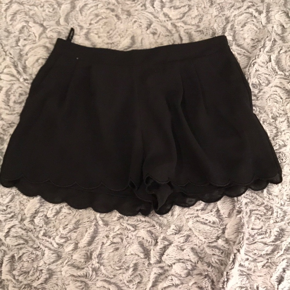 Black scalloped shorts